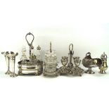 An assortment of silver plate, including a pair of trumpet vases, egg cup set, sugar sifter,