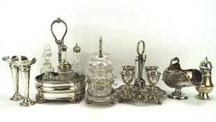 An assortment of silver plate, including a pair of trumpet vases, egg cup set, sugar sifter,