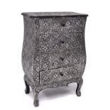 A chest of four drawers of bombe commode shape, covered in embossed metal, H79.