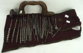An early Moulson of Sheffield brace hand drill and a roll of related bits,