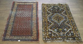 Two 20th century wool blend rugs,