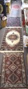 A selection of six floor rugs, of varying sizes and designs,