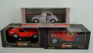 A Minichamp diecast model and two Burago models, the Minichamp a lilac 'Morris Minor',