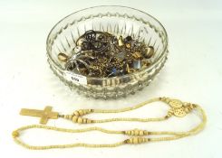 An assortment of costume jewellery, including cufflinks, chains,