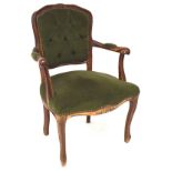 A Louis VX style elbow chair, with a carved mahogany frame,