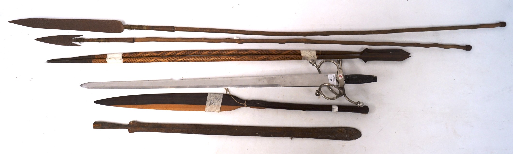 A selection of wooden handled spears and a re-enactment sword, max.