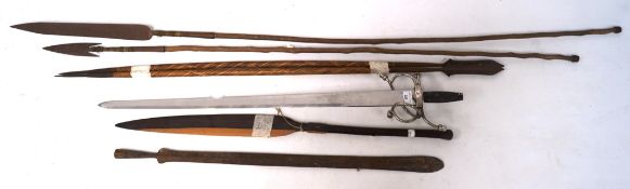 A selection of wooden handled spears and a re-enactment sword, max.