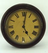 An early 20th century oak cased wall clock, the yellowed dial with Roman numerals denoting hours,