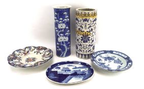 An assortment of Oriental and continental ceramics, including two cylindrical vases,
