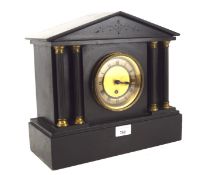 A 20th century slate mantel clock, the gilt dial with Roman numerals, flanked by columns,