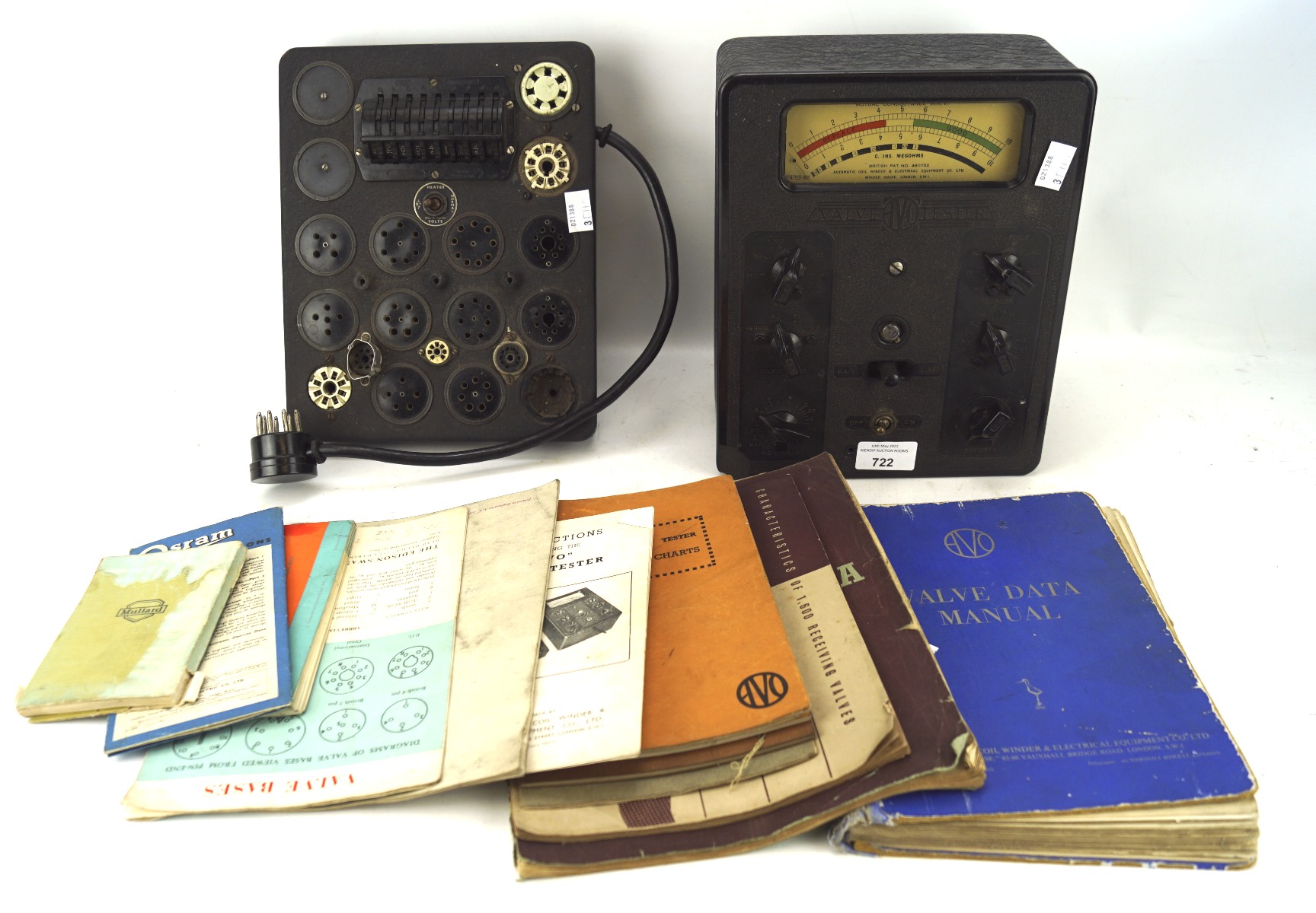 An AVO bakelite cased radio valve tester and related equipment,