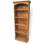 A five shelf pine bookcase,