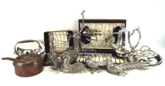 An assortment of silver plate and other metalware, including two boxed sets of fish cutlery,