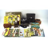 An assortment of collectables, including an Olympus OM-2 camera, a pair of Prinz 10x50 binoculars,