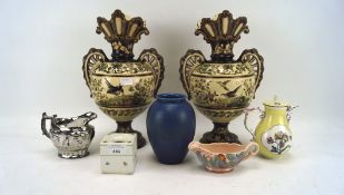 An assortment of 20th century ceramics, including a pair of vases, a Clarice Cliff sauceboat 40A,