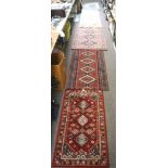 Five 20th century floor rugs, of varying sizes and designs,