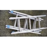 Two small extendable ladders,