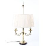 A 20th century brass two-light candelabra table lamp with two candlestick scones,