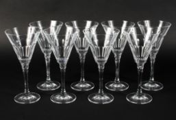 Eight modern large wine or cocktail glasses, with conical fluted bowls, on faceted stems,