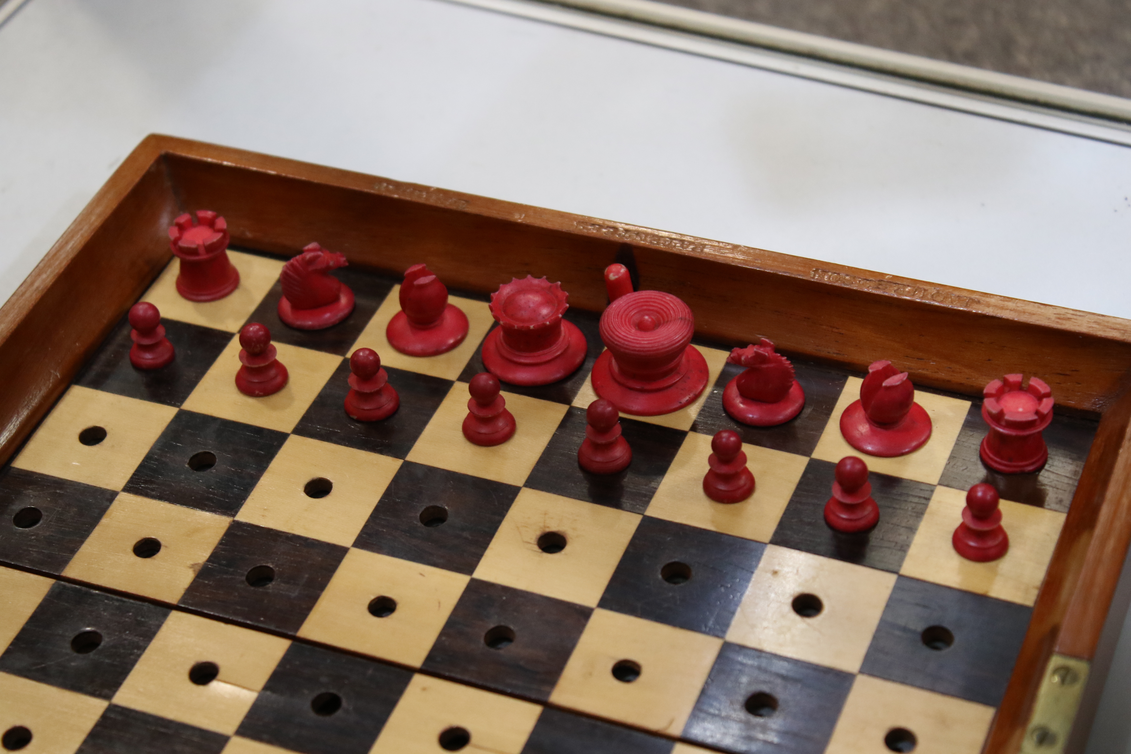 A Jacques & Son (London) travelling chess set in box, with folding mahogany chess board, - Image 4 of 16