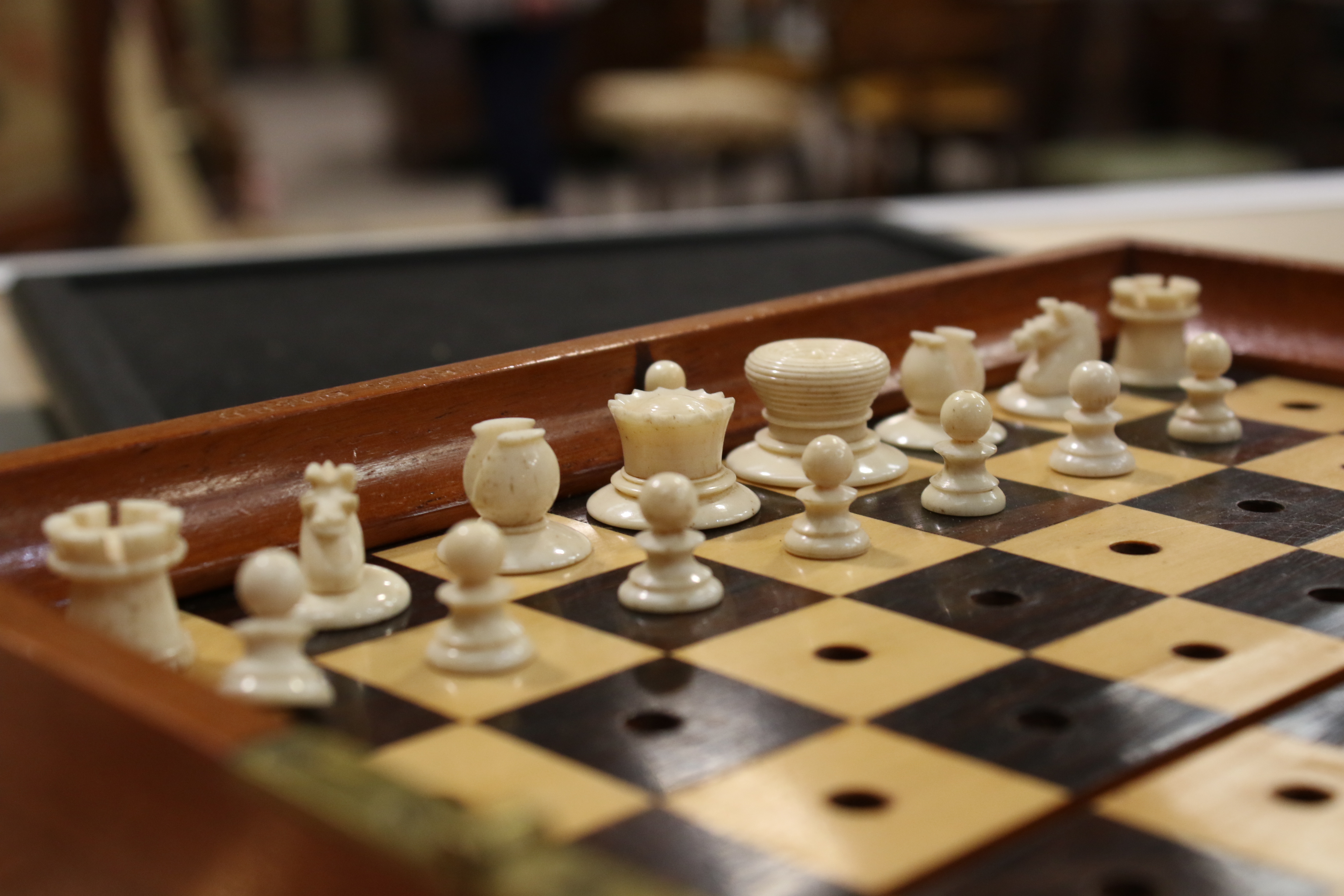 A Jacques & Son (London) travelling chess set in box, with folding mahogany chess board, - Image 12 of 16