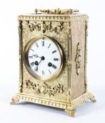 A Victorian brass and gilt-metal mounted eight day striking mantel clock,