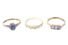 Three assorted 9ct gold dress rings, two set with precious stones, size M,