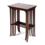 An Edwardian inlaid mahogany nest of four tables raised on slender sabre supports L46cm x D33cm x