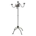 An early 20th century wrought iron five branch floor standing candlabra,