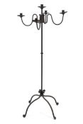 An early 20th century wrought iron five branch floor standing candlabra,