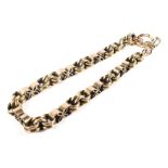 A 10ct gold link bracelet with safety chain,