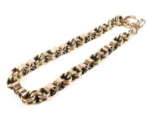 A 10ct gold link bracelet with safety chain,