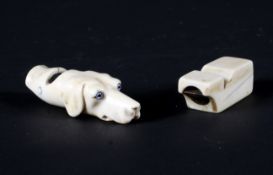 A late 19th century carved ivory whistle in the form of a greyhound's head and another,