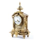 A late 19th century French brass striking eight day mantel clock,