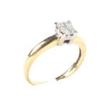 An 18ct gold four stone diamond set as an illusion of a solitair ring size J