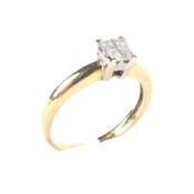 An 18ct gold four stone diamond set as an illusion of a solitair ring size J