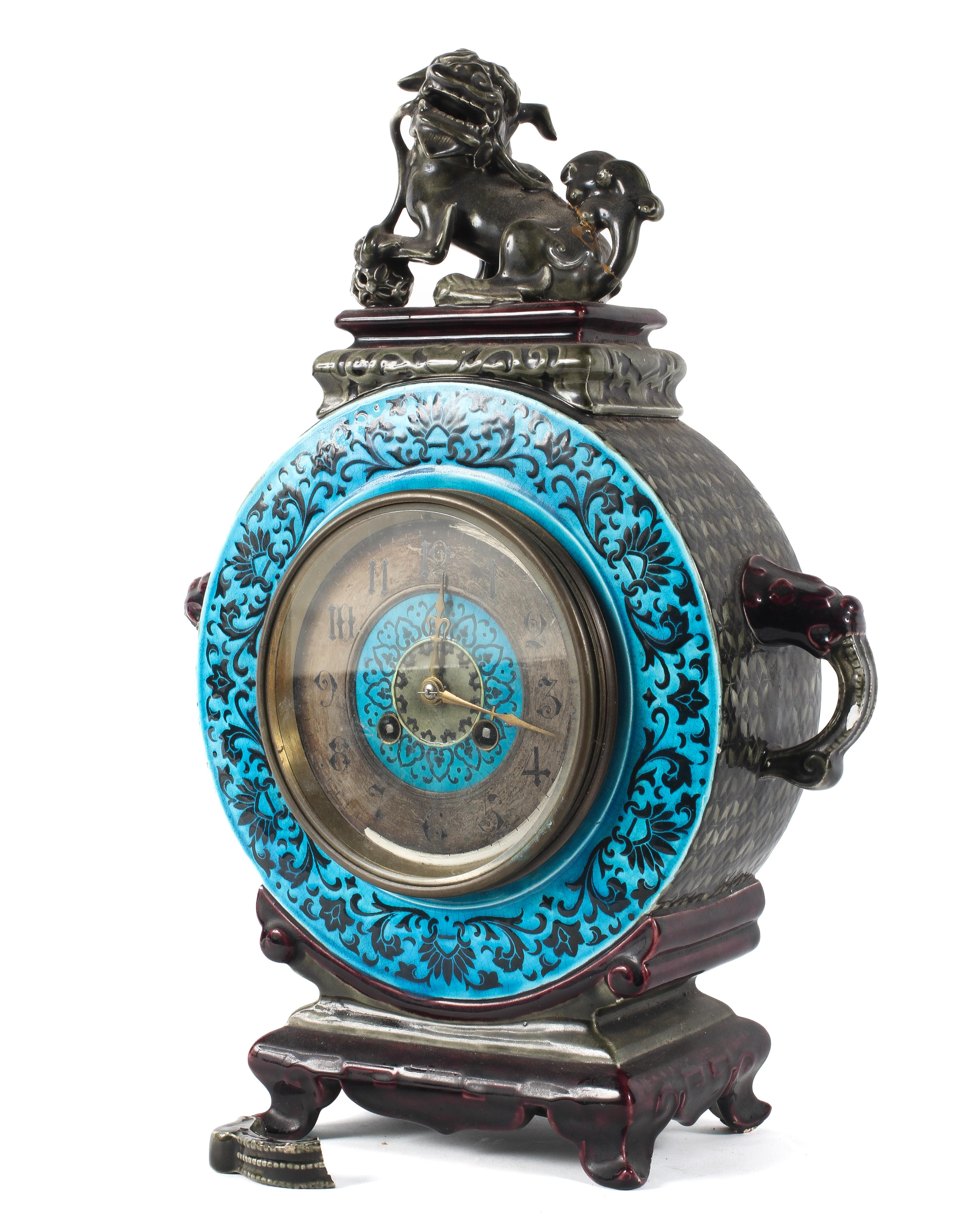 A French majolica and brass mounted chinoiserie eight day mantel clock in the style of Theodore