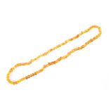 An Amber beaded necklace, 33cm drop,