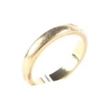 A 22ct gold wedding band,