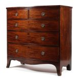 An early 19th century mahogany bow fronted chest of drawers,