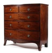 An early 19th century mahogany bow fronted chest of drawers,