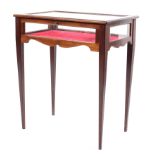 An Edwardian inlaid mahogany bijouterie display table, raised on square tapering supports,