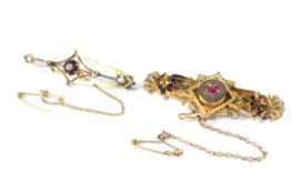 Two late 19th/early 20th century 9ct gold brooches, each set with a single stone,