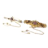 Two late 19th/early 20th century 9ct gold brooches, each set with a single stone,