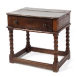 An oak side table, with 17th/18th century elements, the rectangular canted top with single drawer,