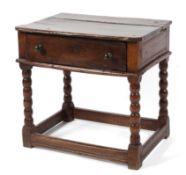 An oak side table, with 17th/18th century elements, the rectangular canted top with single drawer,