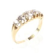 A Victorian five stone diamond ring, mounted in a claw setting,