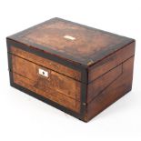A Victorian walnut inlaid writing box, inset with mother of pearl and chequered stringing,