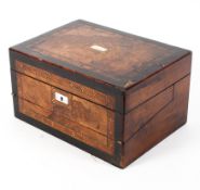 A Victorian walnut inlaid writing box, inset with mother of pearl and chequered stringing,