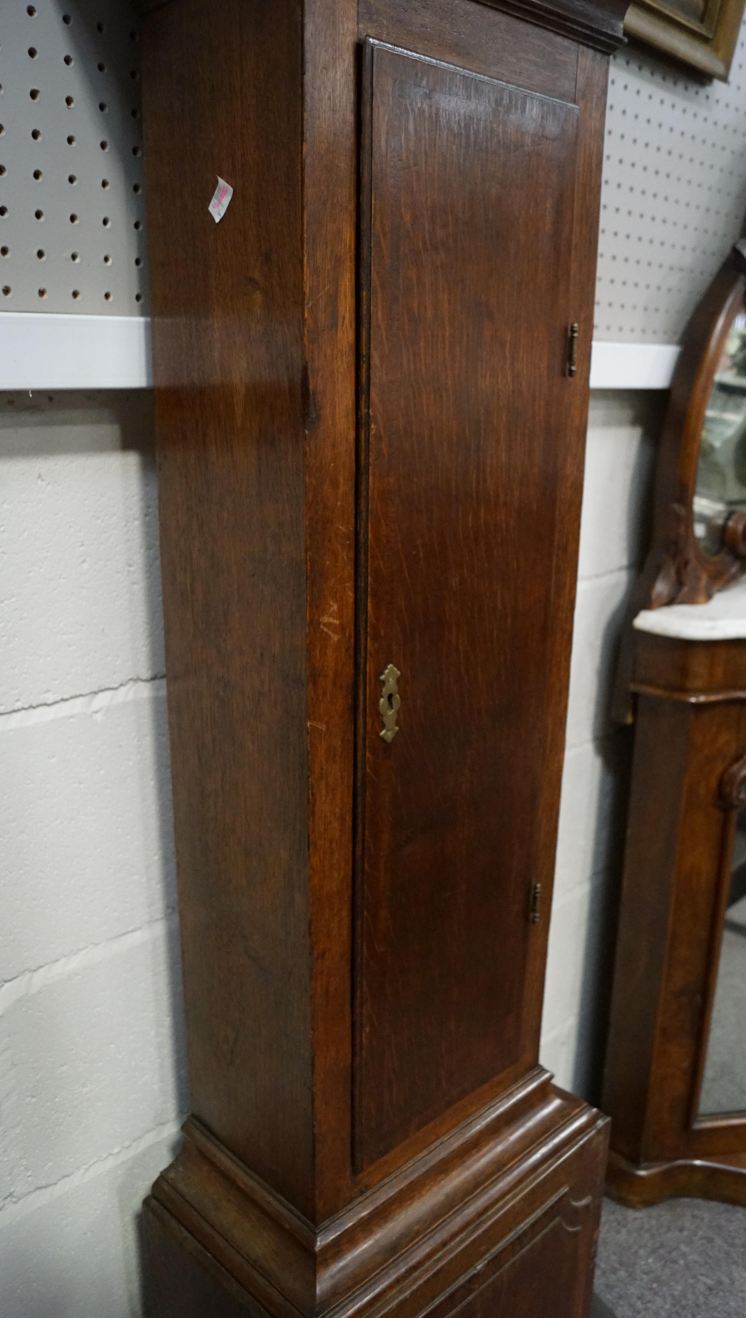 An 18th century oak longcase 30 hour clock with brass dial, named for Thomas Bridge Wigan, - Image 14 of 20